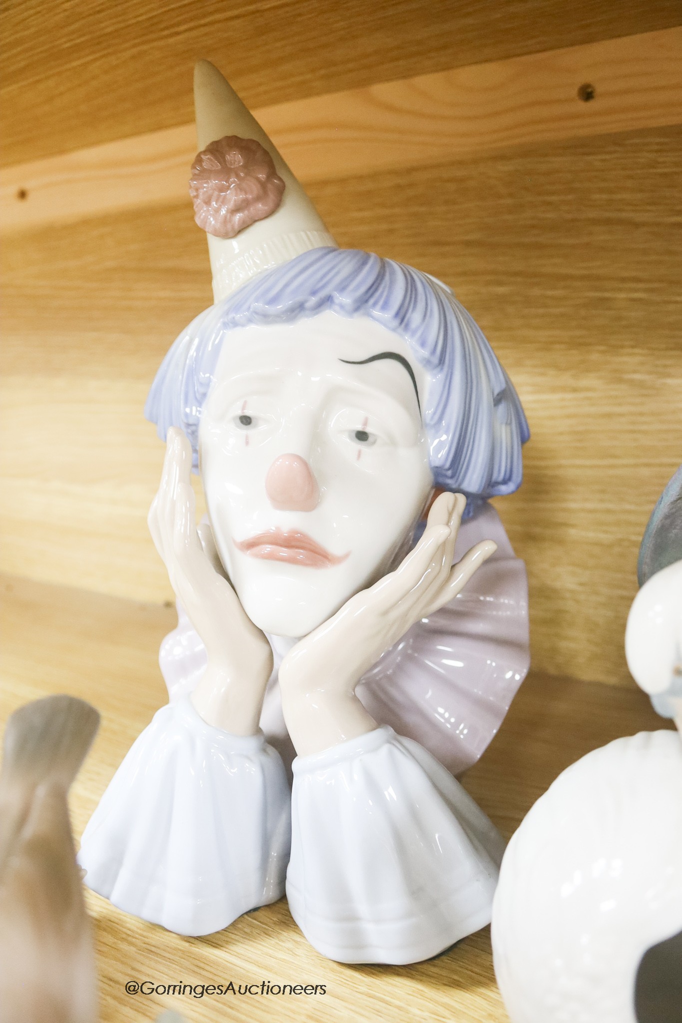 Two Lladro heads and other Lladro pieces